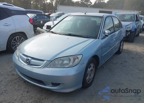 2004 Honda Civic Hybrid from USA, damaged, VIN JHMES96694S017503